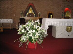 Church pedestal white lilys