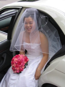 Bride with Red Rose Posy